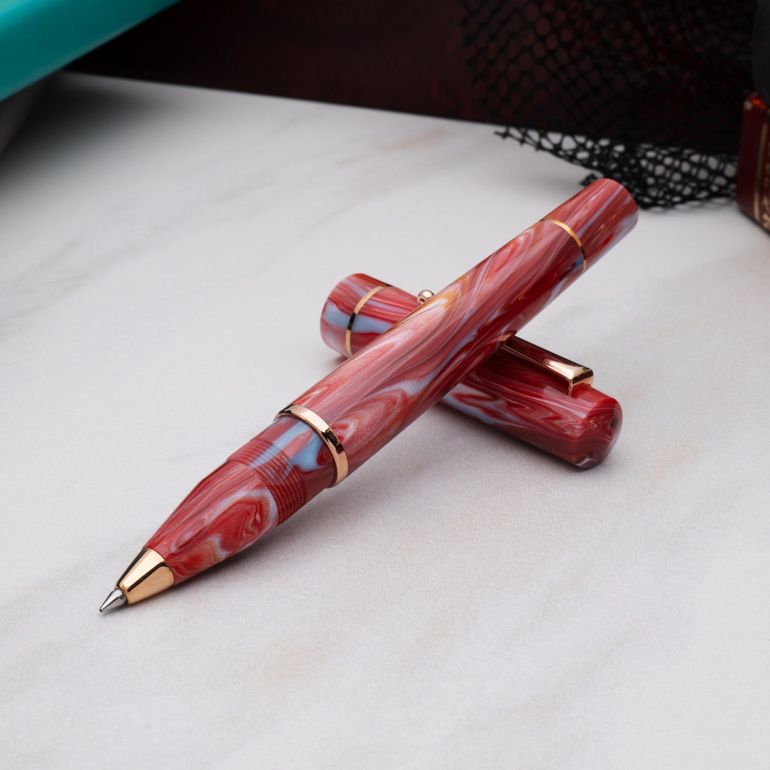 Delta Duna Ghibli(Red) Rosegold Trim Rollerball Pen