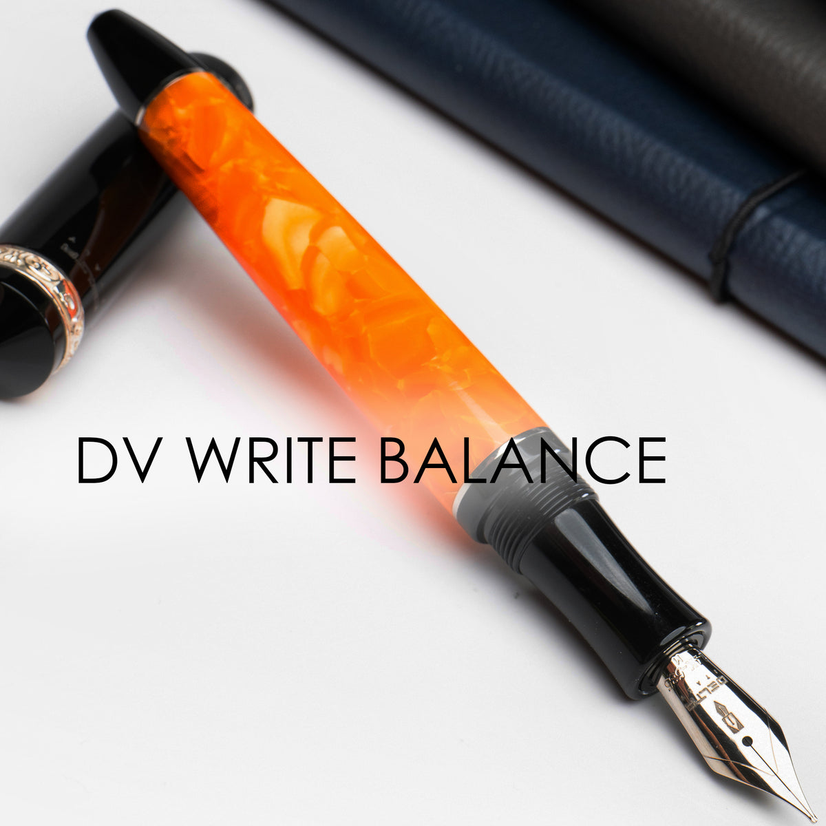 Fountain pen with orange and black design on a white background, featuring 'DV Write Balance' text.