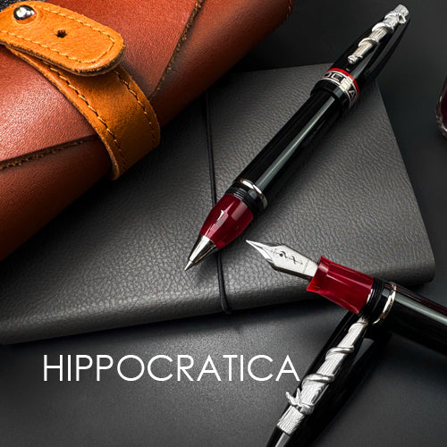 Fountain pen on a dark surface, featuring the brand 'Hippocratica'.